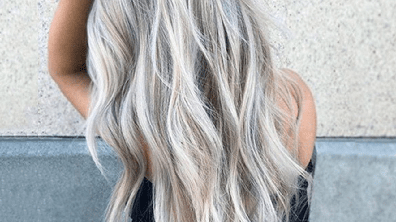 Choosing The Perfect Layered Gray Wig: Synthetic vs Human Hair - Which is Right for You?